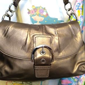 bronzed colored leather coach purse